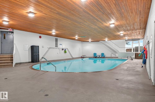 #106 5125 Riverbend Rd Nw, Edmonton, AB - Indoor Photo Showing Other Room With In Ground Pool