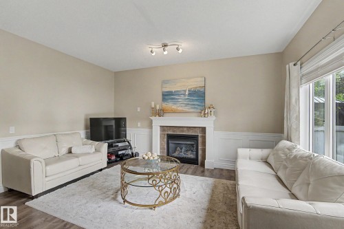 5632 201 St Nw, Edmonton, AB - Indoor Photo Showing Living Room With Fireplace
