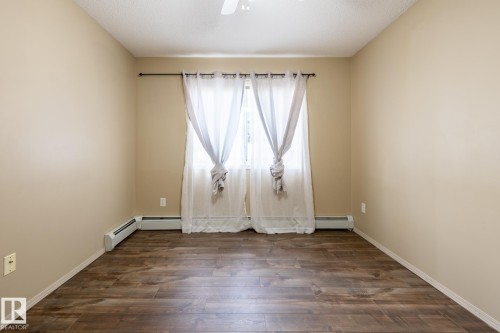 #106 1188 Hyndman Rd Nw, Edmonton, AB - Indoor Photo Showing Other Room
