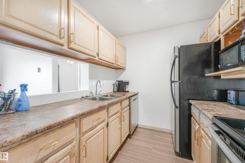 #410 5065 31 Av Nw, Edmonton, AB - Indoor Photo Showing Kitchen With Double Sink