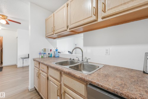 #410 5065 31 Av Nw, Edmonton, AB - Indoor Photo Showing Kitchen With Double Sink