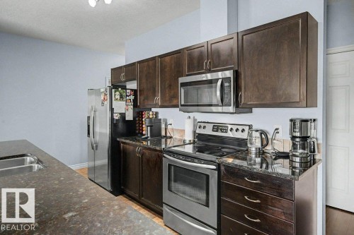 #204 5 Perron St, St. Albert, AB - Indoor Photo Showing Kitchen With Double Sink