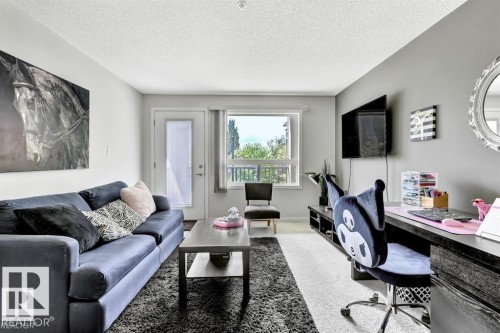 #229 1520 Hammond Gate Nw, Edmonton, AB - Indoor Photo Showing Living Room