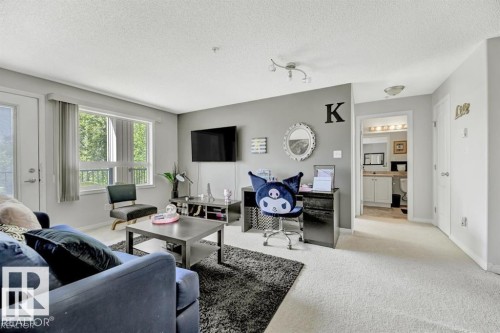 #229 1520 Hammond Gate Nw, Edmonton, AB - Indoor Photo Showing Living Room