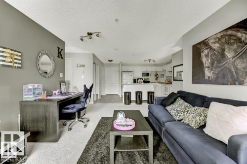 #229 1520 Hammond Gate Nw, Edmonton, AB - Indoor Photo Showing Living Room