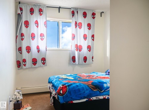 #301 104 10 St, Cold Lake, AB - Indoor Photo Showing Bedroom