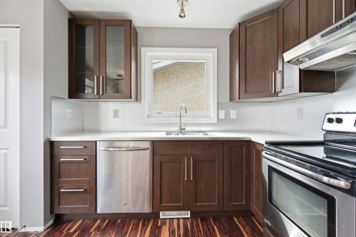 18303 76 Avenue Nw, Edmonton, AB - Indoor Photo Showing Kitchen With Double Sink
