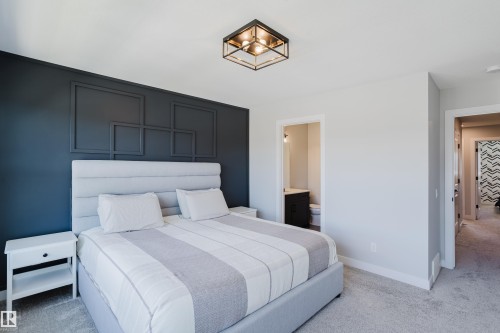1665 Plum Circle Circle Sw, Edmonton, AB - Indoor Photo Showing Bedroom