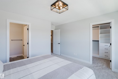 1665 Plum Circle Circle Sw, Edmonton, AB - Indoor Photo Showing Bedroom