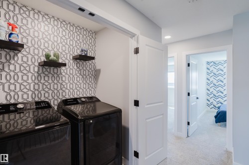 1665 Plum Circle Circle Sw, Edmonton, AB - Indoor Photo Showing Laundry Room
