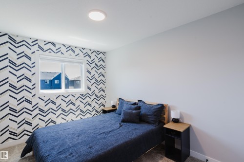 1665 Plum Circle Circle Sw, Edmonton, AB - Indoor Photo Showing Bedroom