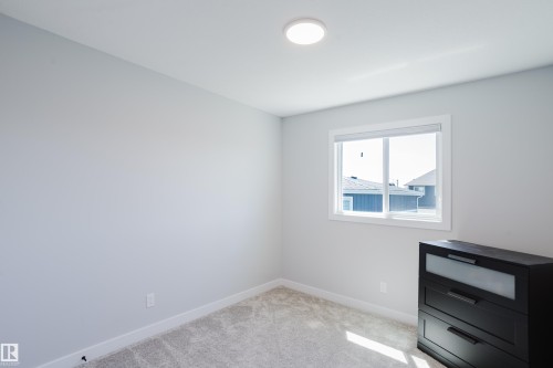 1665 Plum Circle Circle Sw, Edmonton, AB - Indoor Photo Showing Other Room