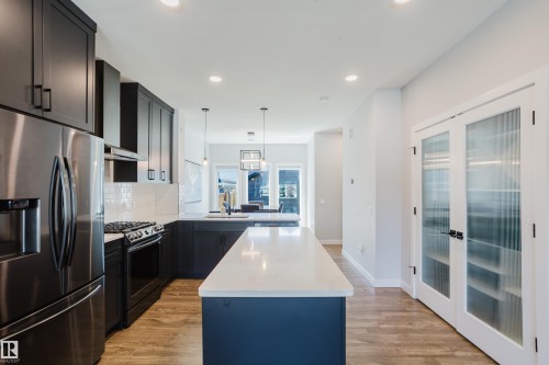 1665 Plum Circle Circle Sw, Edmonton, AB - Indoor Photo Showing Kitchen With Stainless Steel Kitchen With Upgraded Kitchen