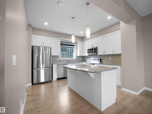 2080 Wonnacott Way Sw, Edmonton, AB - Indoor Photo Showing Kitchen With Upgraded Kitchen