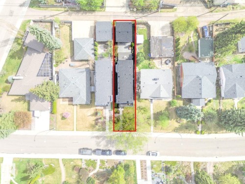 Aerial view highlighting a property with a distinct, elongated footprint - 11613 72 Avenue Nw, Edmonton, AB -  With View