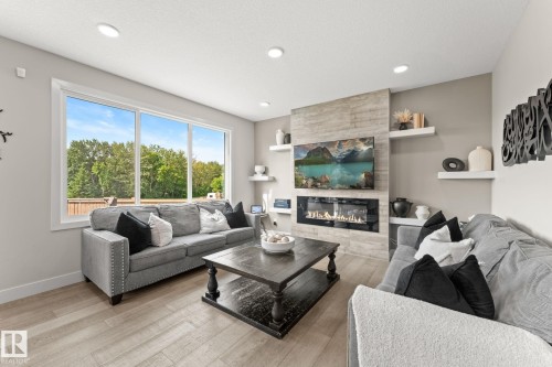 12383 176 Avenue Nw, Edmonton, AB - Indoor Photo Showing Living Room With Fireplace