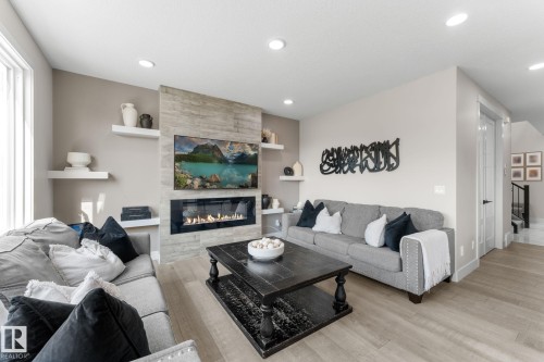 12383 176 Avenue Nw, Edmonton, AB - Indoor Photo Showing Living Room With Fireplace