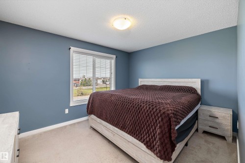 #2202 8530 94 St, Fort Saskatchewan, AB - Indoor Photo Showing Bedroom