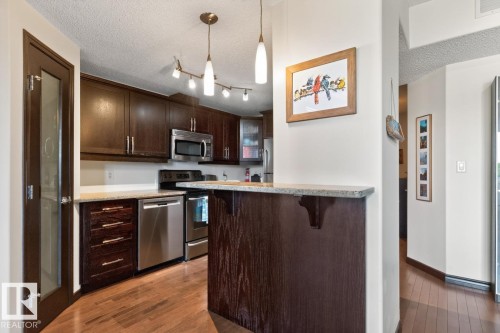 #801 9707 106 St Nw, Edmonton, AB - Indoor Photo Showing Kitchen With Stainless Steel Kitchen