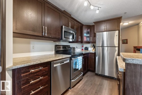 #801 9707 106 St Nw, Edmonton, AB - Indoor Photo Showing Kitchen With Stainless Steel Kitchen