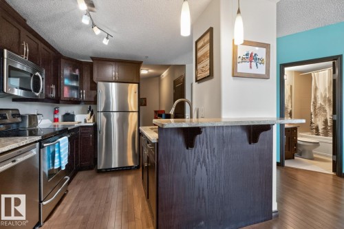 #801 9707 106 St Nw, Edmonton, AB - Indoor Photo Showing Kitchen With Stainless Steel Kitchen