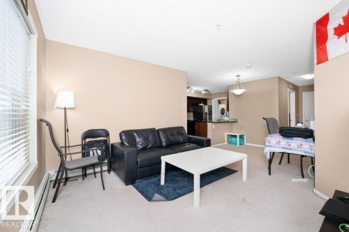 #221 111 Watt Cm Sw, Edmonton, AB - Indoor Photo Showing Living Room