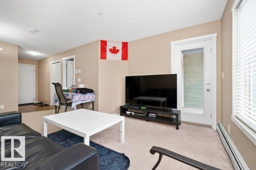 #221 111 Watt Cm Sw, Edmonton, AB - Indoor Photo Showing Living Room