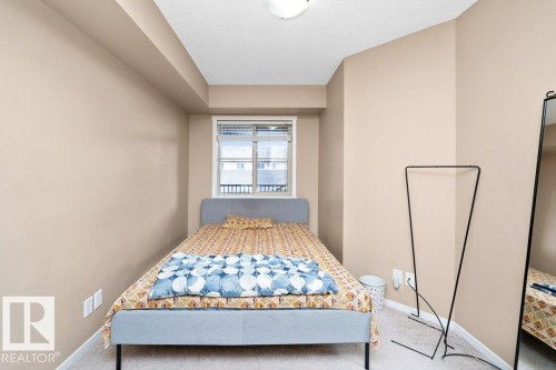 #221 111 Watt Cm Sw, Edmonton, AB - Indoor Photo Showing Bedroom