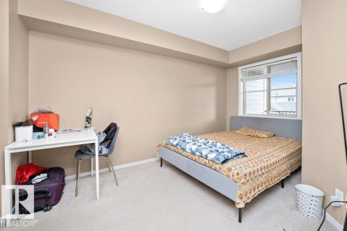 #221 111 Watt Cm Sw, Edmonton, AB - Indoor Photo Showing Bedroom