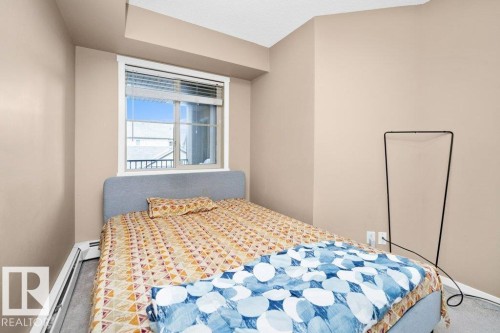 #221 111 Watt Cm Sw, Edmonton, AB - Indoor Photo Showing Bedroom