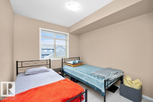 #221 111 Watt Cm Sw, Edmonton, AB - Indoor Photo Showing Bedroom