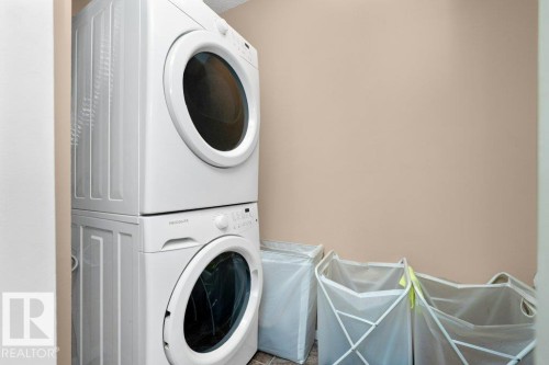 #221 111 Watt Cm Sw, Edmonton, AB - Indoor Photo Showing Laundry Room