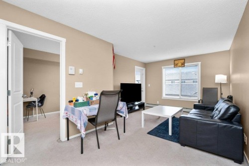 #221 111 Watt Cm Sw, Edmonton, AB - Indoor Photo Showing Living Room