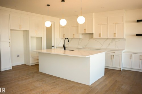 34 Mckenzie Close Close, Leduc, AB - Indoor Photo Showing Kitchen With Upgraded Kitchen