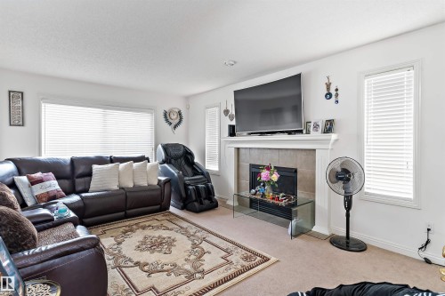 20404 60 Avenue Nw, Edmonton, AB - Indoor Photo Showing Living Room With Fireplace