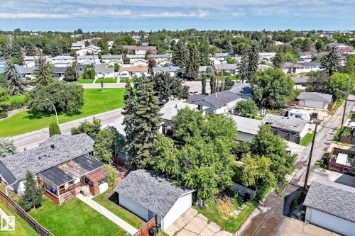 Residential neighborhood with mature trees, green spaces, and an established street grid - 5519 142 Avenue Nw, Edmonton, AB - Outdoor With View