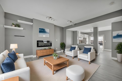 Virtually Staged - #13 13003 132 Av Nw, Edmonton, AB - Indoor Photo Showing Living Room