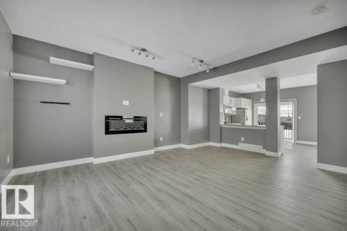 #13 13003 132 Av Nw, Edmonton, AB - Indoor With Fireplace
