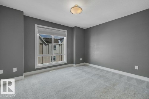 #13 13003 132 Av Nw, Edmonton, AB - Indoor Photo Showing Other Room