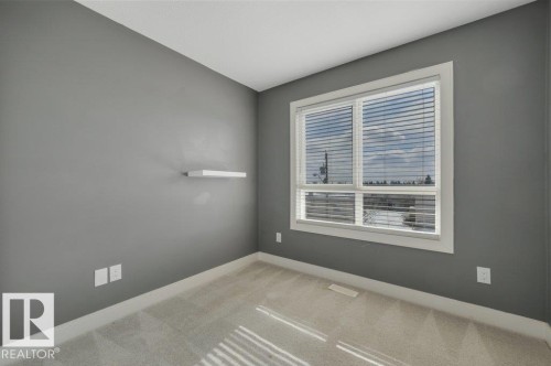 #13 13003 132 Av Nw, Edmonton, AB - Indoor Photo Showing Other Room
