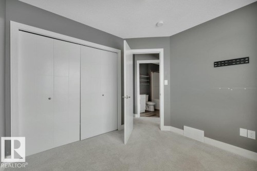 #13 13003 132 Av Nw, Edmonton, AB - Indoor Photo Showing Other Room