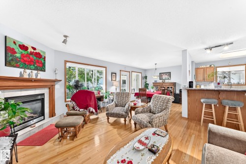 #204 4807 43A Av, Leduc, AB - Indoor Photo Showing Living Room With Fireplace