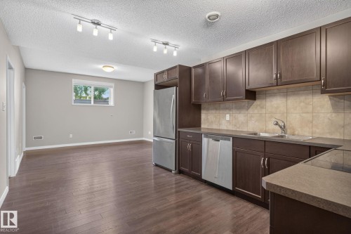3536 Claxton Crescent Sw, Edmonton, AB - Indoor Photo Showing Kitchen With Double Sink