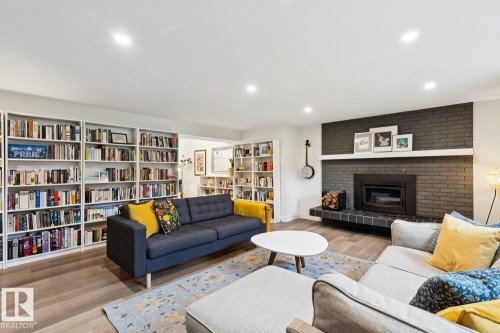 13615 Buena Vista Road Nw, Edmonton, AB - Indoor Photo Showing Living Room With Fireplace