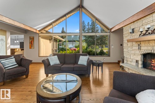 203 Pine Avenue, Cold Lake, AB - Indoor Photo Showing Living Room With Fireplace