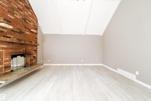 6907 19 Avenue Nw, Edmonton, AB - Indoor Photo Showing Other Room With Fireplace