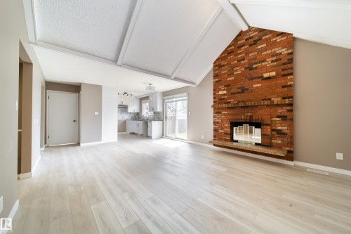 6907 19 Avenue Nw, Edmonton, AB - Indoor Photo Showing Living Room With Fireplace