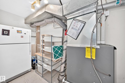 Utility area featuring an HVAC system and exposed ductwork - 290 Lancaster Terrace Nw, Edmonton, AB - Indoor