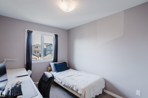 4331 Cooke Lane Sw, Edmonton, AB - Indoor Photo Showing Bedroom