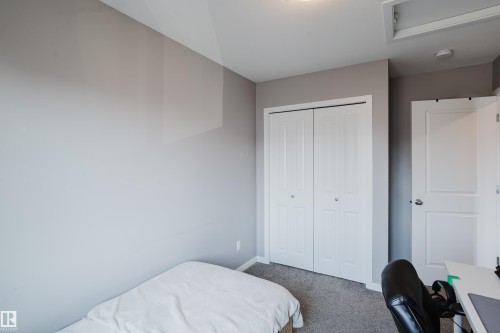 4331 Cooke Lane Sw, Edmonton, AB - Indoor Photo Showing Bedroom